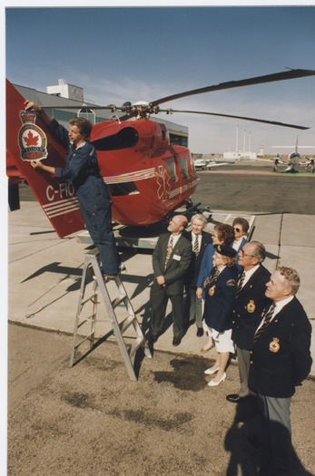 Application of Royal Canadian Legion logo on STARS helicopter tailfin