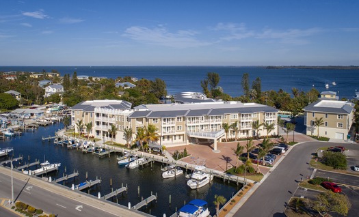 Waterline---Aerial---High-to-Bay-Daytime-Ships-Approaching---round-two