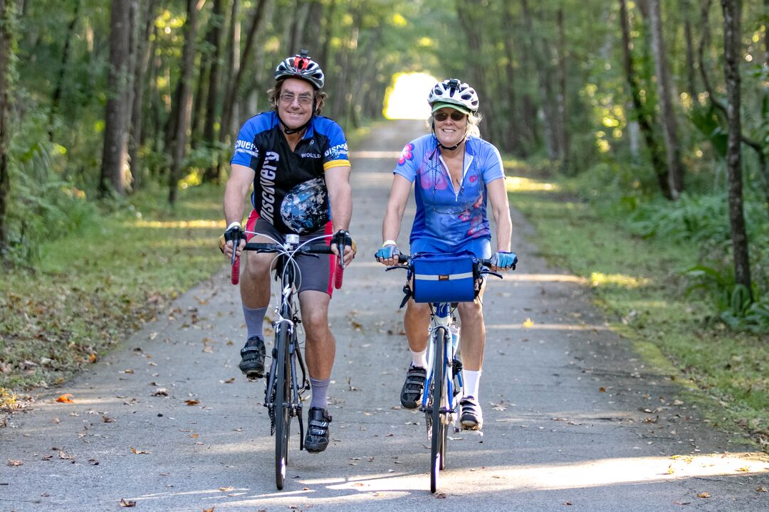 Pair of Cyclists on Bike Trail, Florida's Adventure Coast