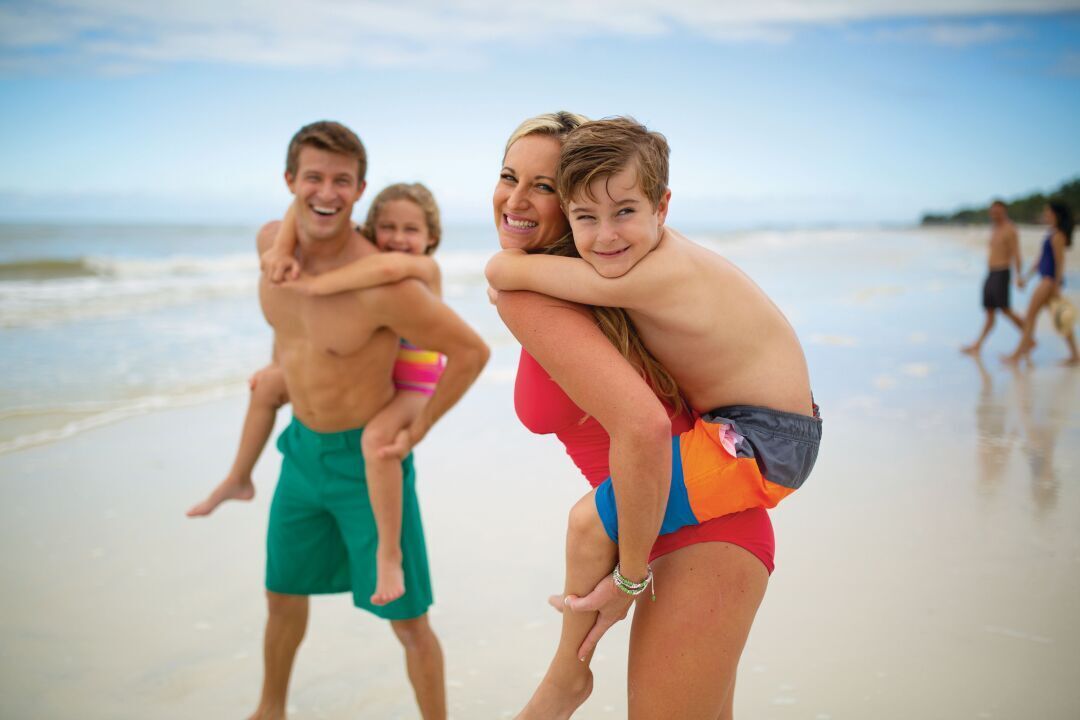 Beach Family - piggyback