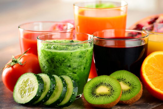 Glasses of fresh organic vegetable and fruit juices