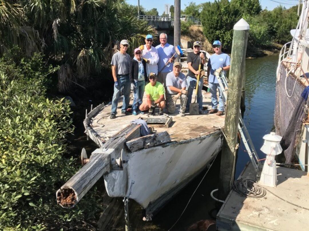 Volunteers Preparing Ghost Ship for Reef