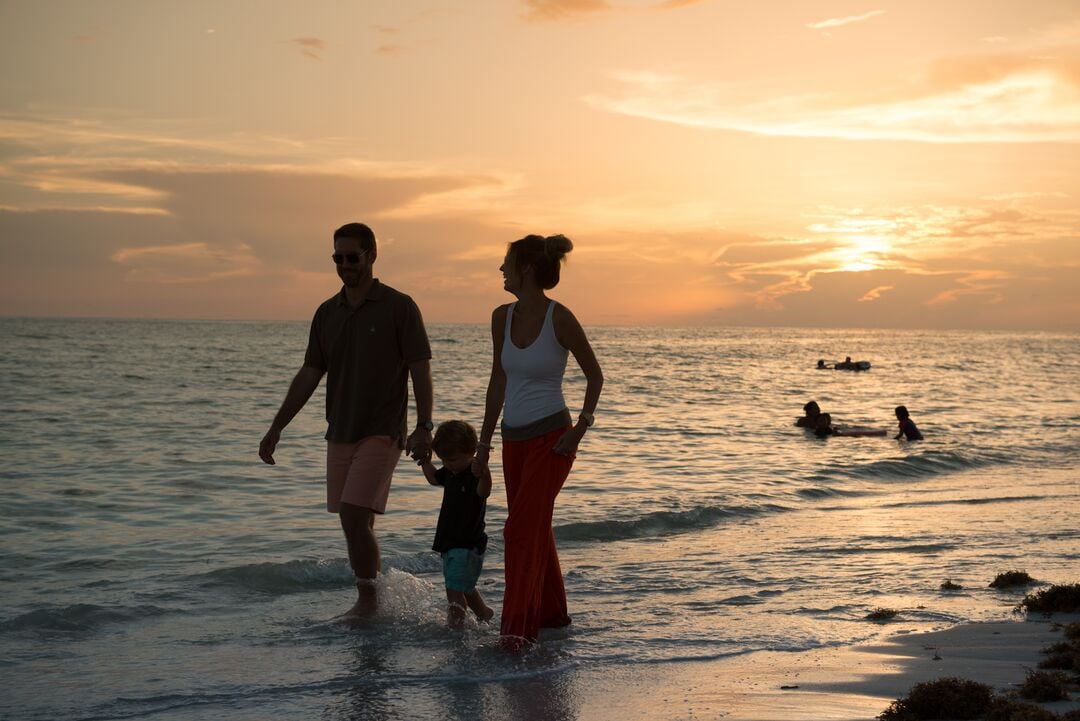 Family Walking on Beach