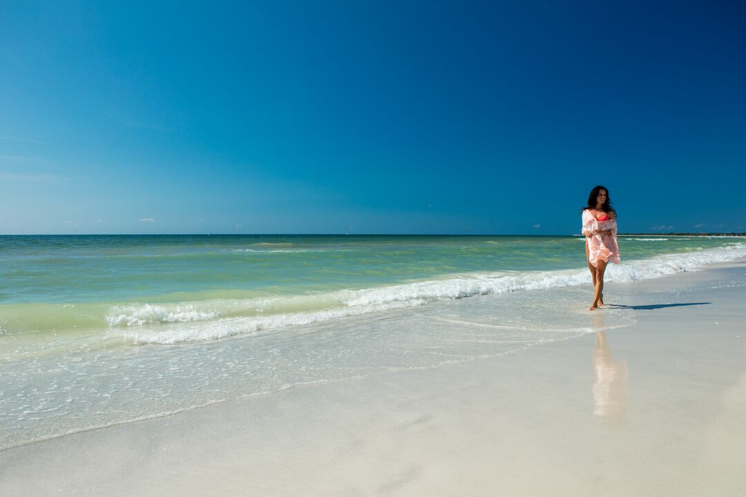 Woman Walking On Marco Island Beach
