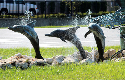 Dolphin Sculpture with Hernando Beach Sign, Spring Hill