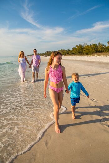 Family Walking Shoreline at AMI