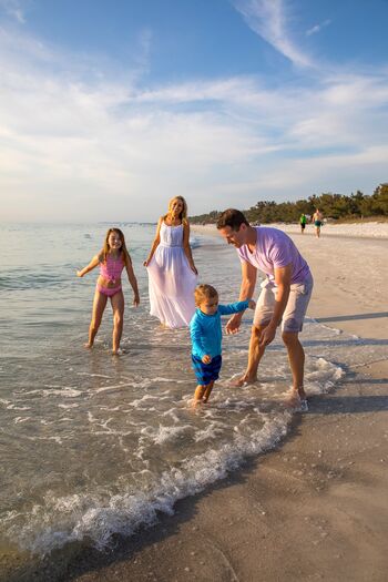 Family Walking Shoreline at AMI