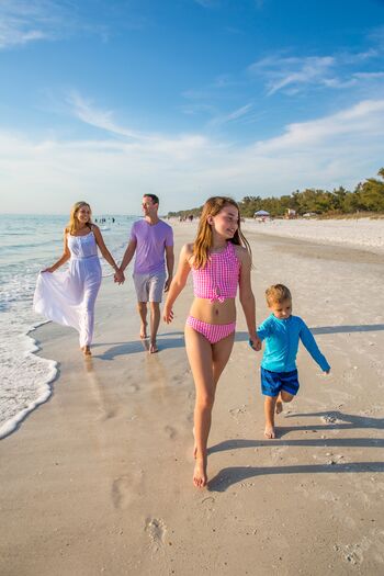 Family Walking Shoreline at AMI