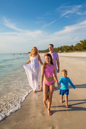 Family Walking Shoreline at AMI
