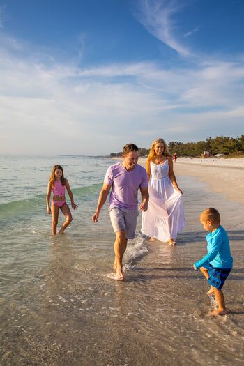 Family Walking Shoreline at AMI