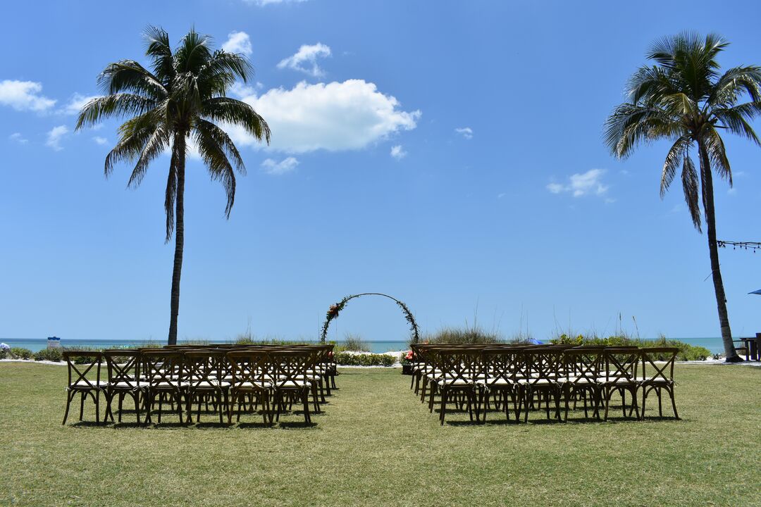 Beachfront lawn wedding setup