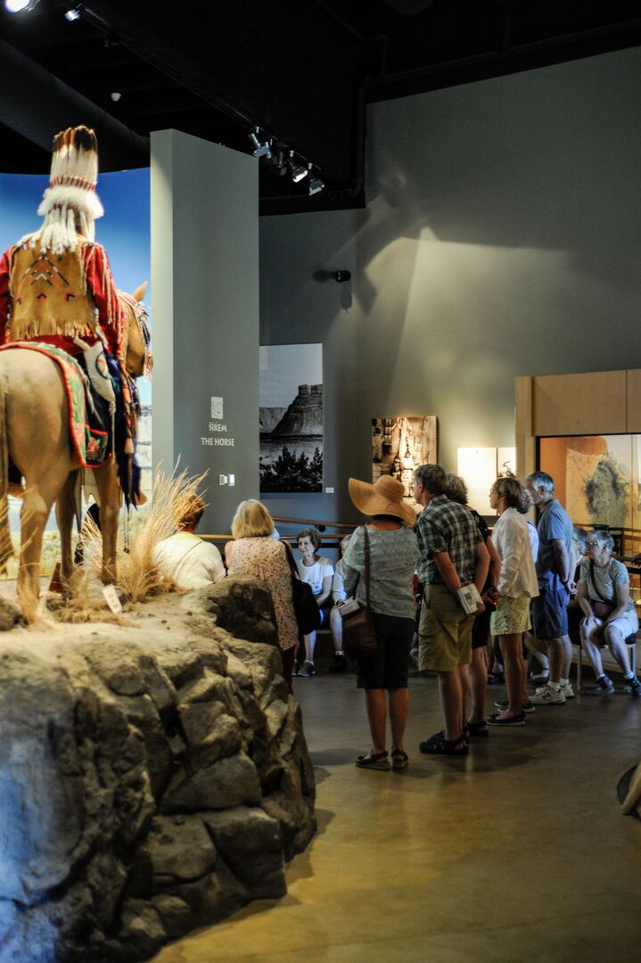 Visitors at Tamastslikt permanent exhibit