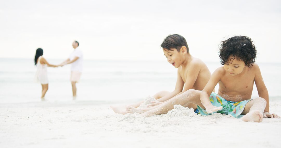 Family on Beach - Madden Media