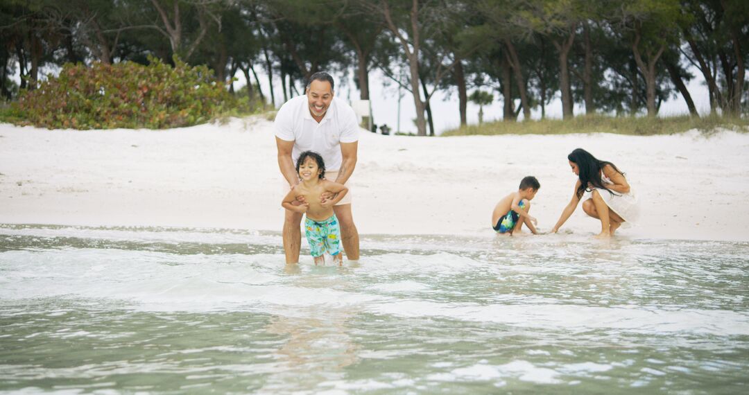 Family on Beach - Madden Media