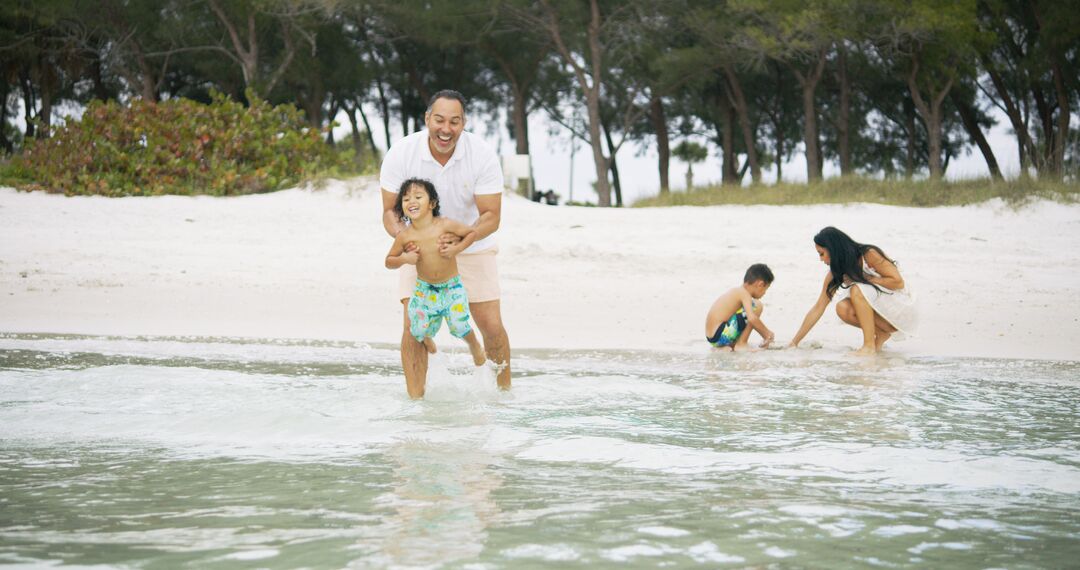 Family on Beach - Madden Media