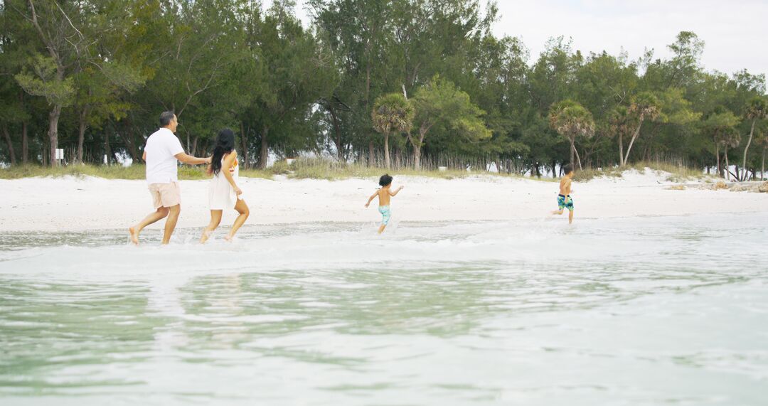 Family on Beach - Madden Media