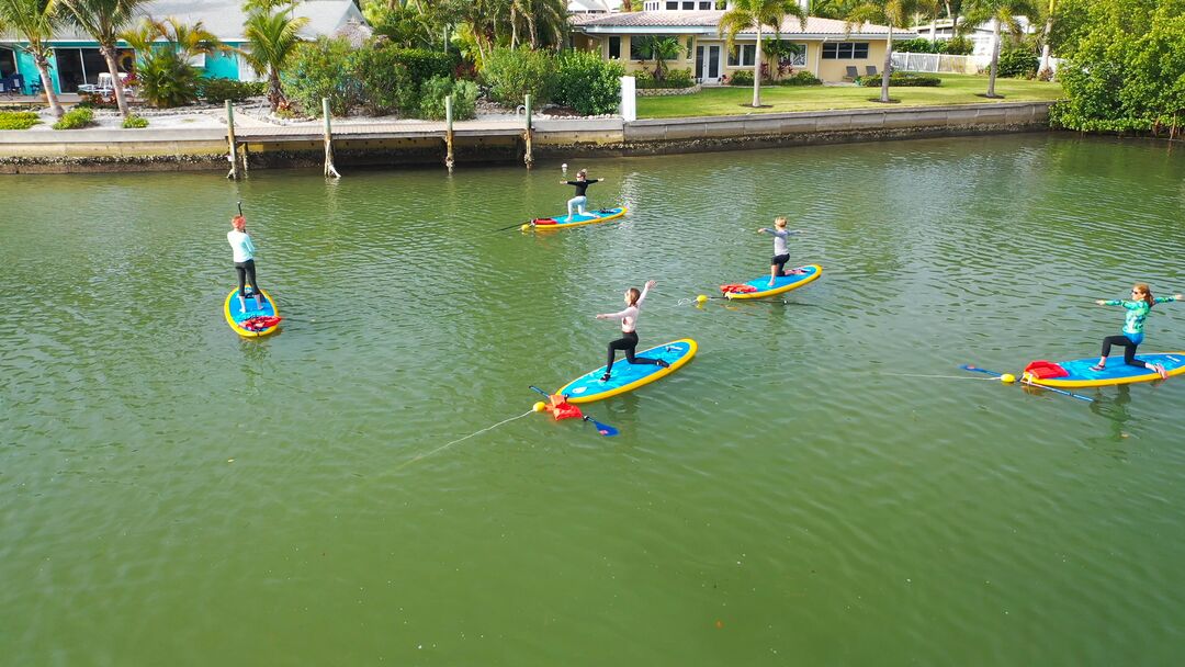 Yoga on Paddleboard - Madden Media