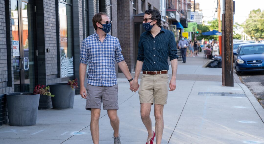 Couple Walks down Fairmount Ave