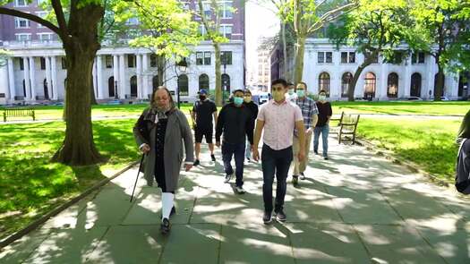 Group in masks tours Old City Philadelphia