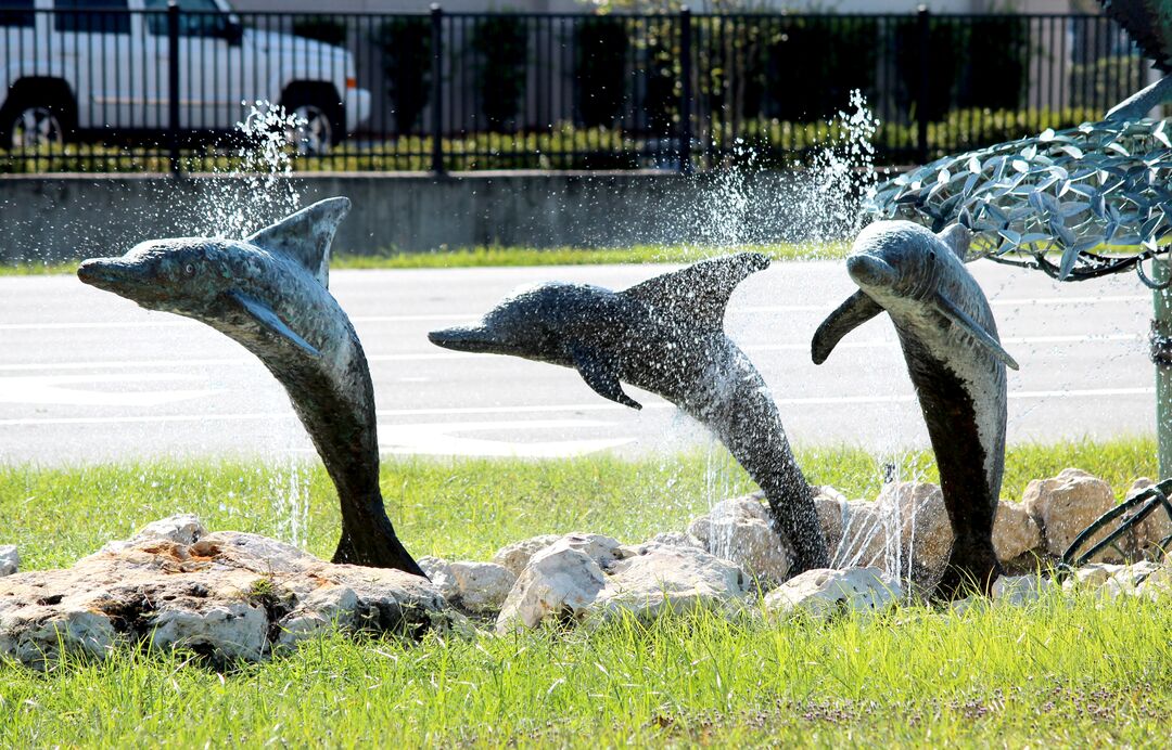 Dolphin Sculpture at Hernando Beach Sign, Florida's Adventure Coast