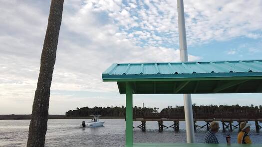 Bayport Pier Kiosk Boat Departing