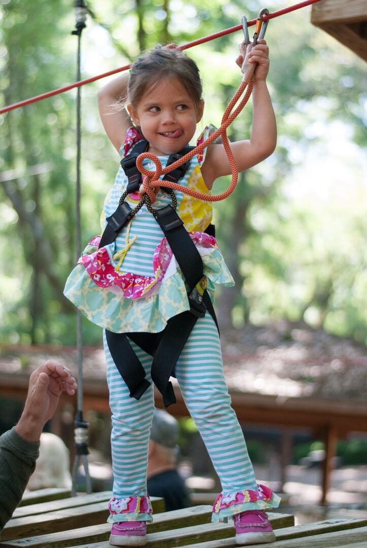 Girl on Zipline – photo courtesy of Tallahassee Museum