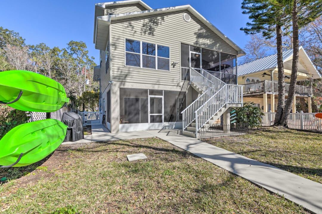 2 story exterior with kayaks