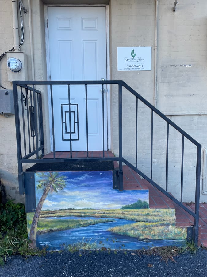 Spa on Main back steps mural