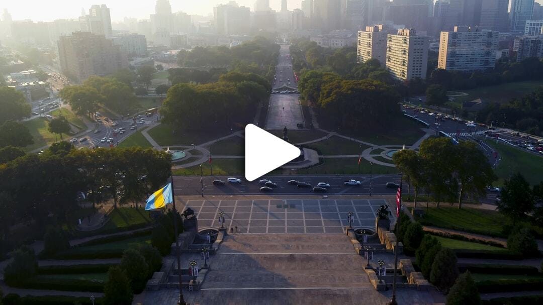 Drone pans up over the Philadelphia Museum of Art, towards the downtown skyline video credit Nick Lang for PHLCVB